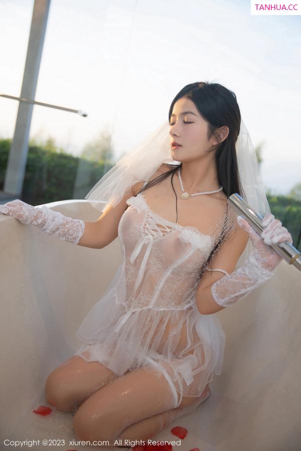   [XiuRen]高清写真图 2023.06.29 No.6994 谭小灵 婚纱美腿第48张图片